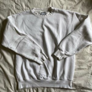 White TNA/Aritzia “Cozy AF” crewneck sweater